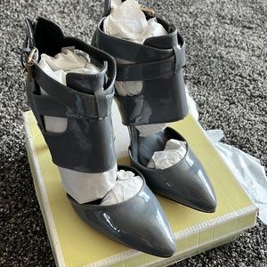 Closed toed heels with buckle size 8.5